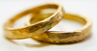 Gold hammered wedding rings by Colette Hazelwood Contemporary Jewellery